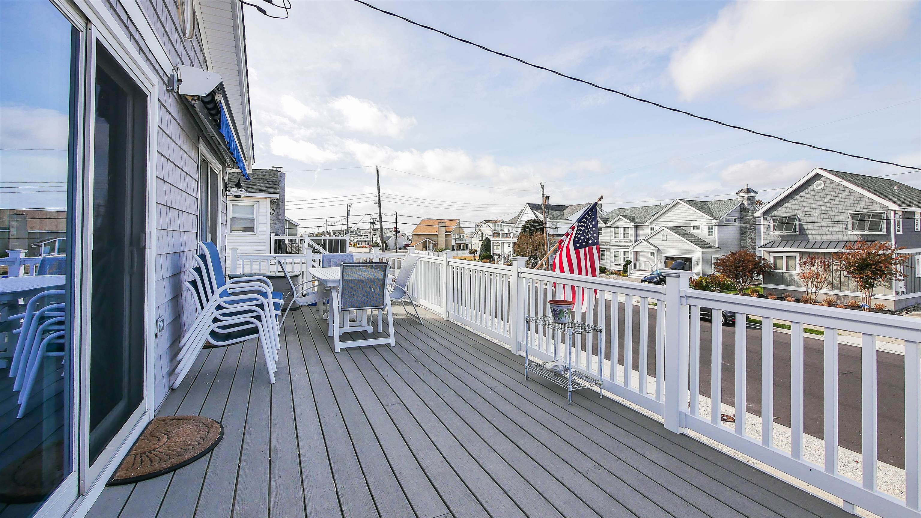 4025 4th, Unit TOP Avalon, NJ 08202 - Photo 24 of 32 a view of roof deck with patio