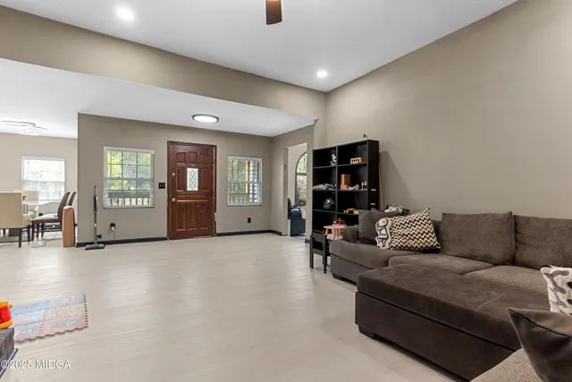 a living room with furniture and a couch