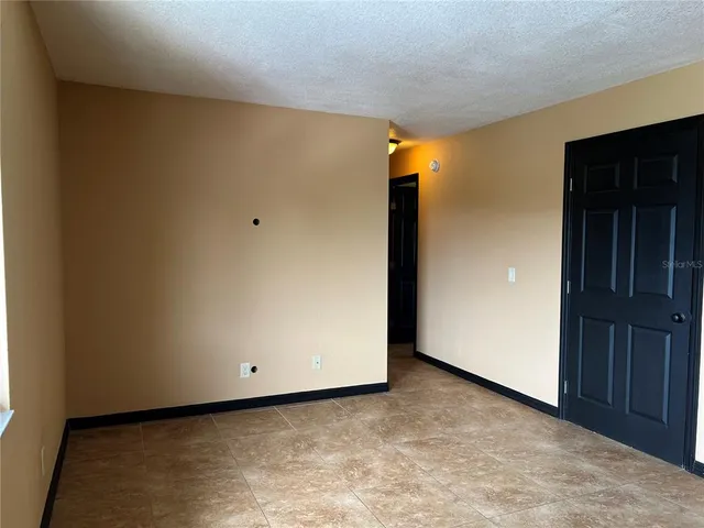 a view of a room with a large door