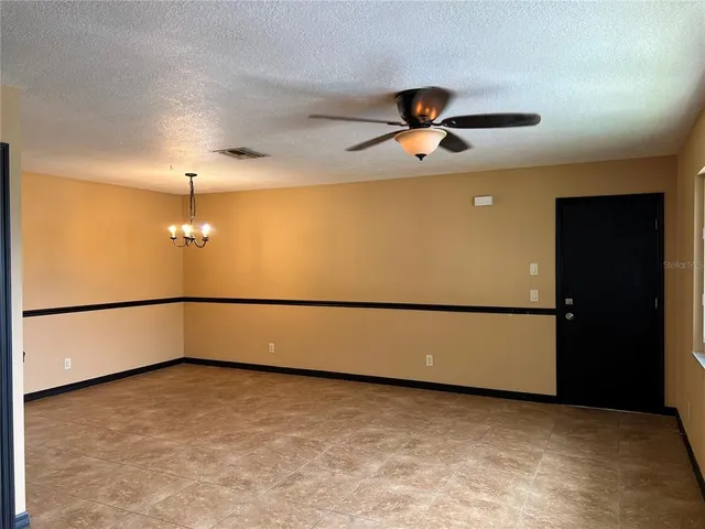 a view of a refrigerator in a room