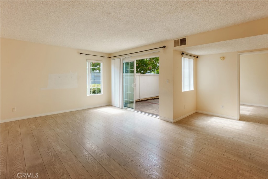 19111 Hamlin Street Reseda, CA 91335 - Photo 8 of 20 Living room w/sliding door to the patio.