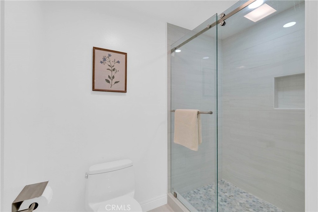 28127 Ridgethorne Court Rancho Palos Verdes, CA 90275 - Photo 21 of 36 a bathroom with a shower and a toilet