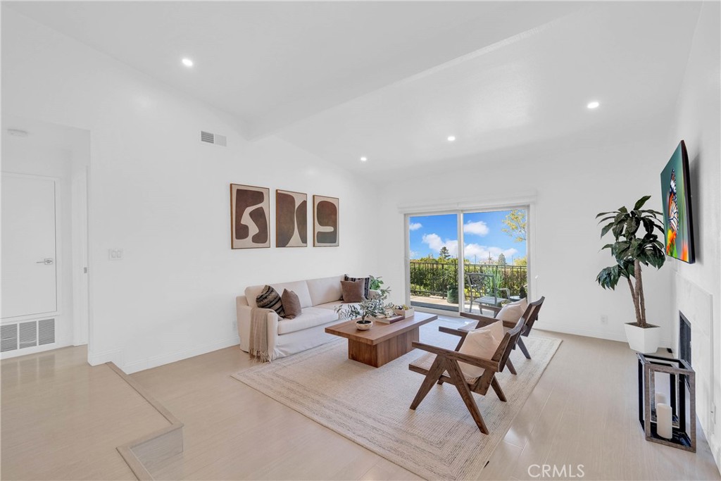 28127 Ridgethorne Court Rancho Palos Verdes, CA 90275 - Photo 6 of 36 a living room with furniture and a flat screen tv