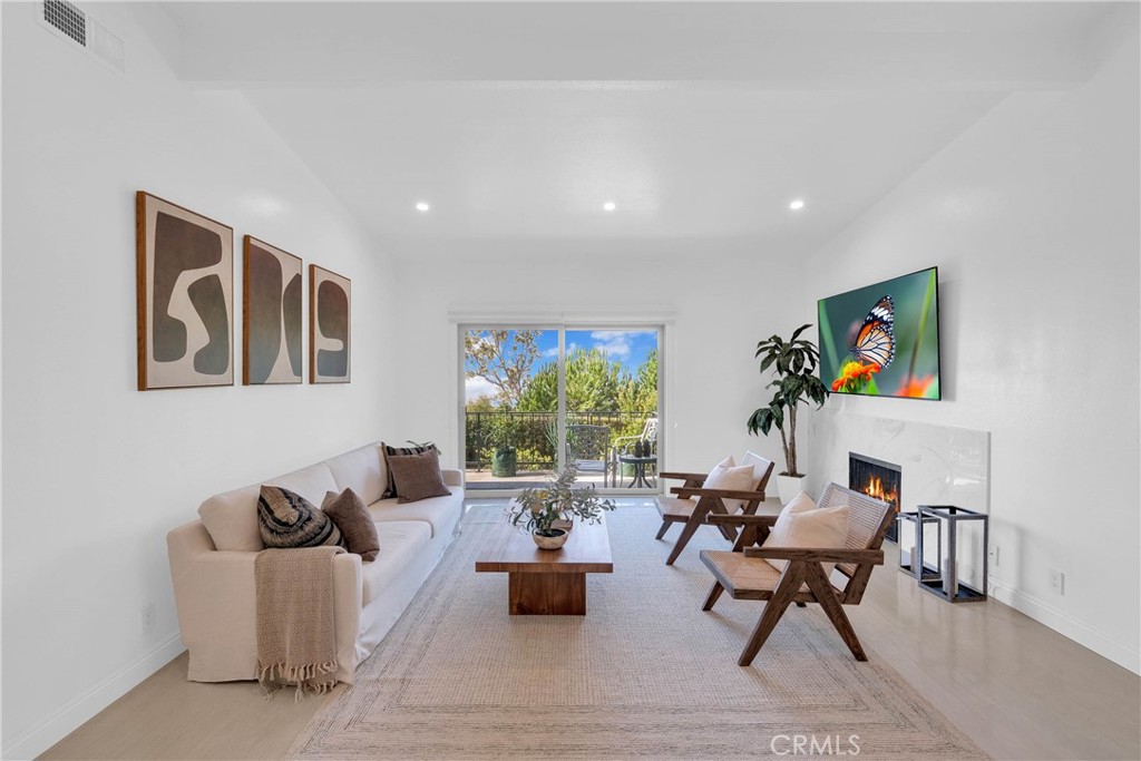 28127 Ridgethorne Court Rancho Palos Verdes, CA 90275 - Photo 7 of 36 a living room with furniture and a large window