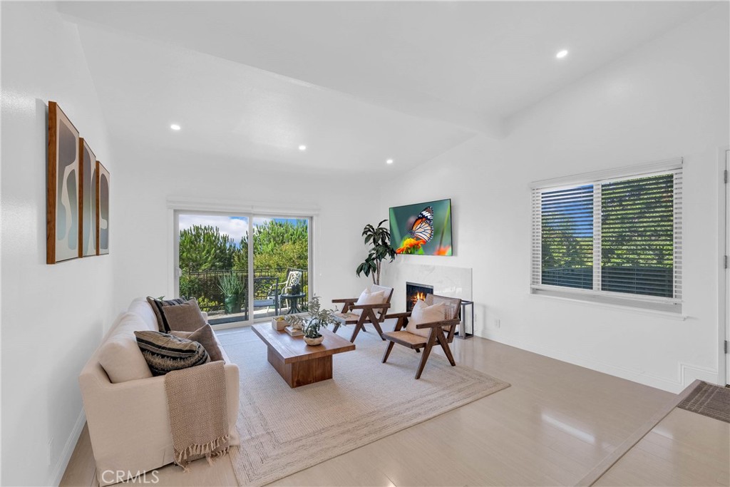 28127 Ridgethorne Court Rancho Palos Verdes, CA 90275 - Photo 8 of 36 a living room with furniture and a potted plant