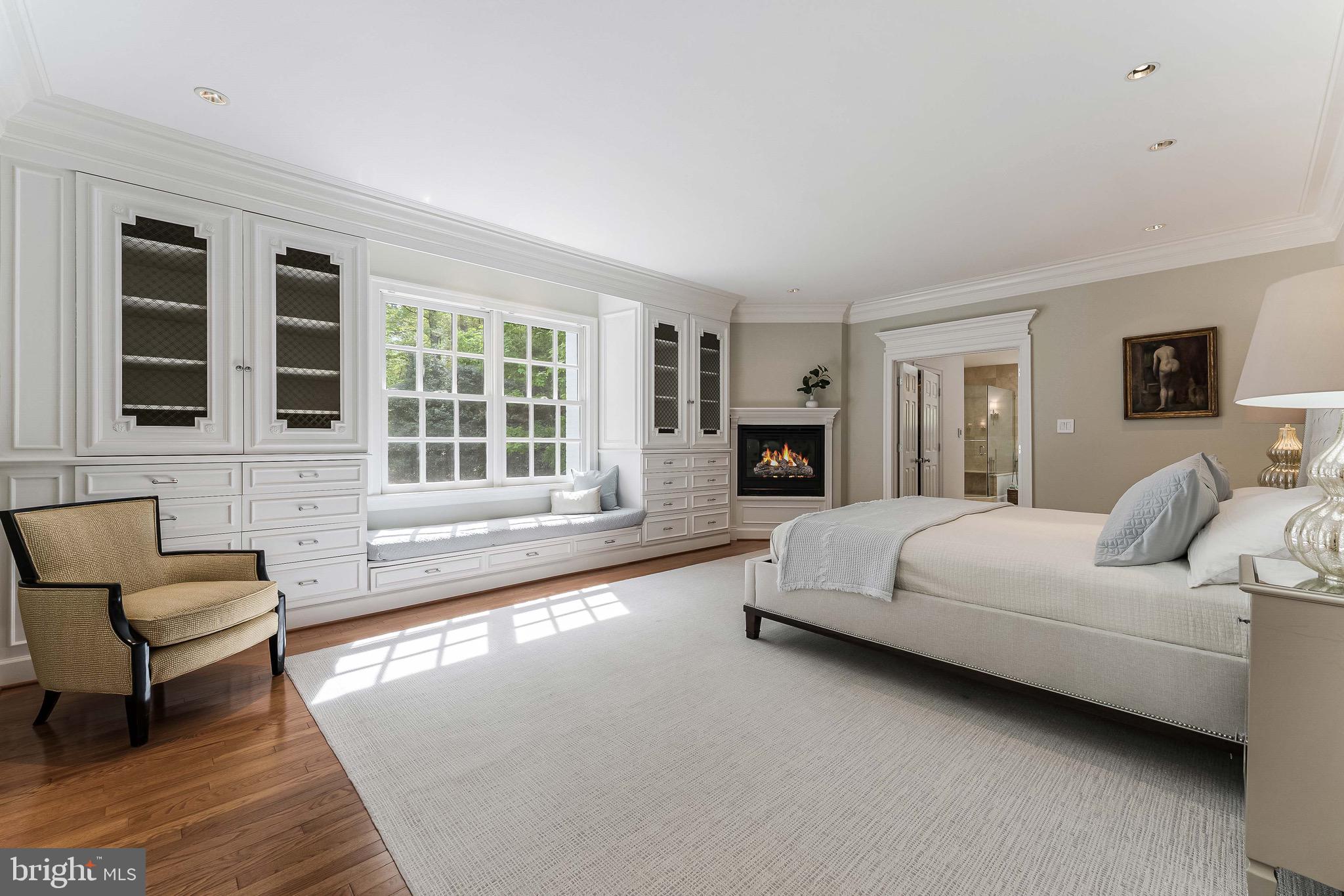 1210 Windrock Drive McLean, VA 22102 - Photo 37 of 84 a spacious bedroom with a bed and glass window