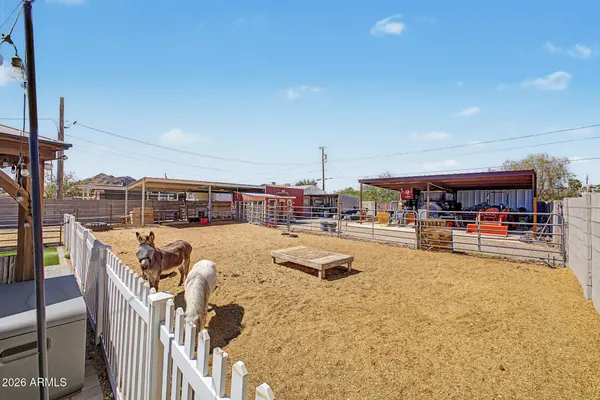a bed room with a bed and a large window