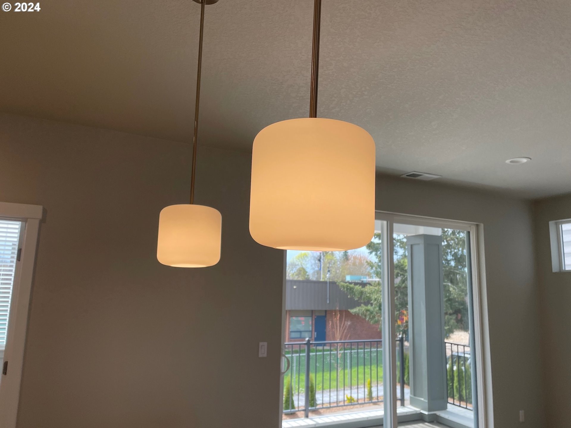 20735 Southwest Boyd Court, Unit 10 Beaverton, OR 97003 - Photo 8 of 47 a lamp on a table near a window