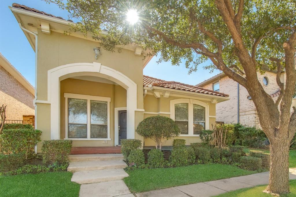 6781 Camino Rio Irving, TX 75039 - Photo 1 of 25 a front view of a house with garden