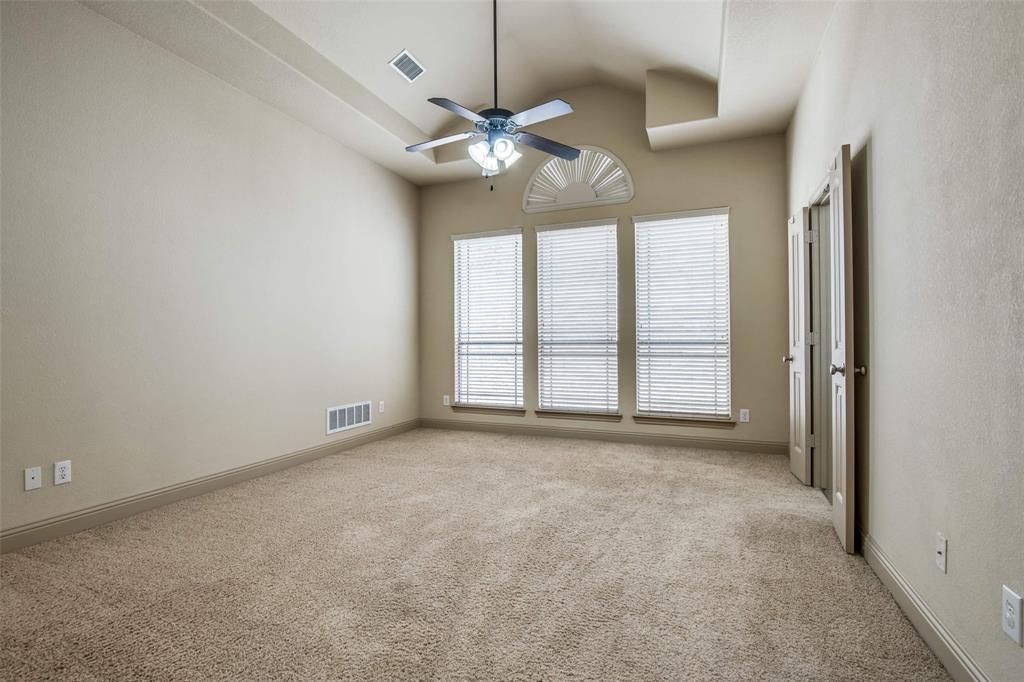 6781 Camino Rio Irving, TX 75039 - Photo 17 of 25 a view of an empty room with a window