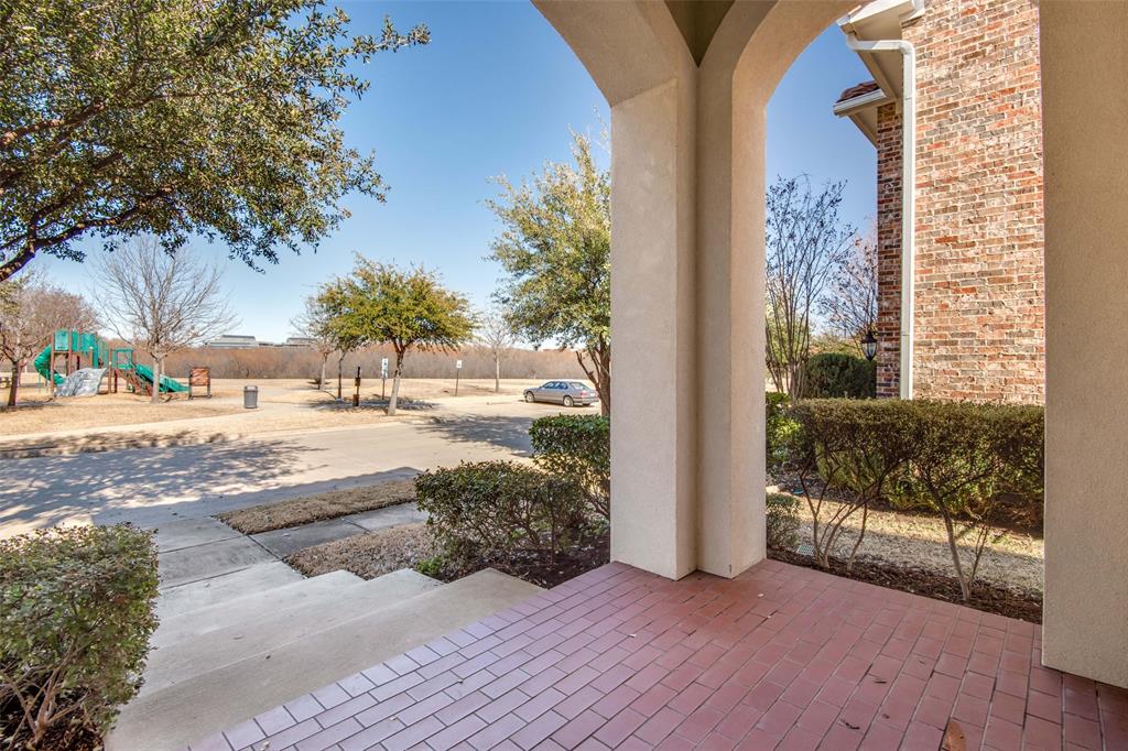 6781 Camino Rio Irving, TX 75039 - Photo 2 of 25 a view of a porch and a yard