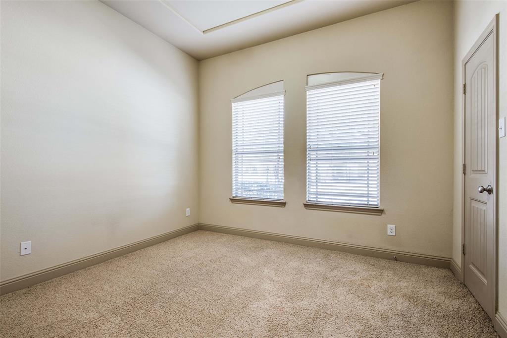 6781 Camino Rio Irving, TX 75039 - Photo 21 of 25 an empty room with a window