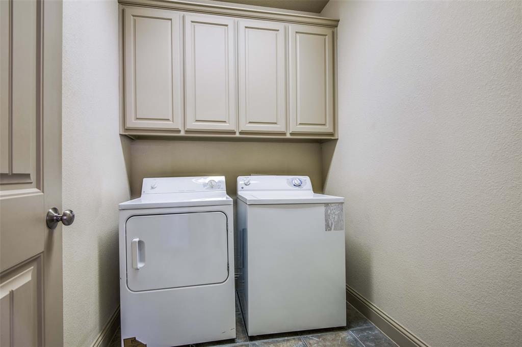 6781 Camino Rio Irving, TX 75039 - Photo 23 of 25 a utility room with dryer and washer