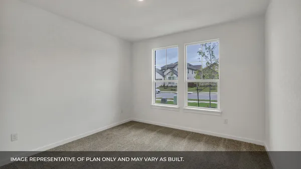 a kitchen with stainless steel appliances a refrigerator and a stove top oven