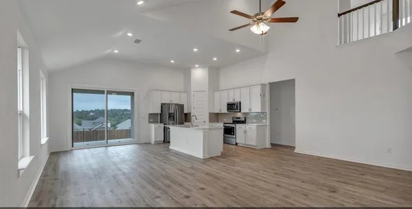 a bathroom with a bathtub and shower