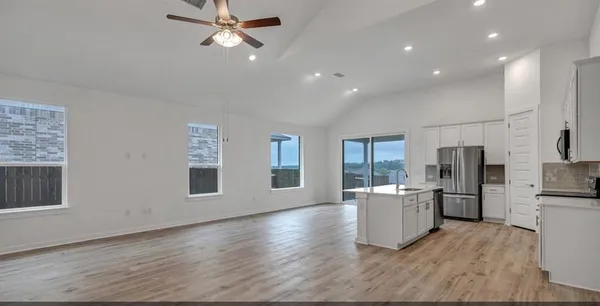 an empty room with windows