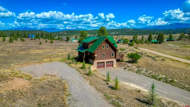 a view of a city with lots of trees