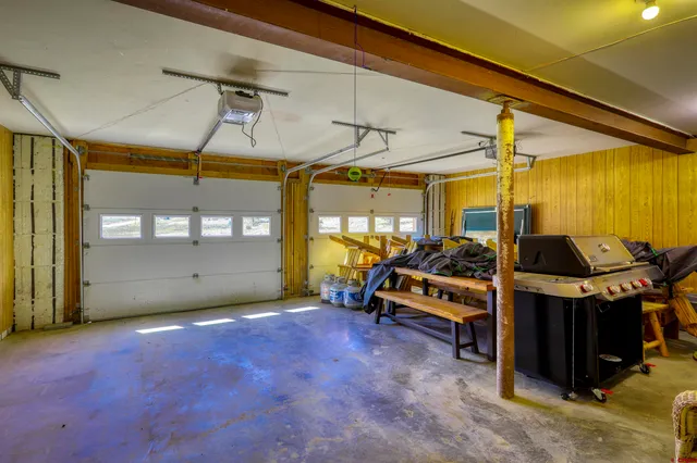 a picture of a book and a white wall