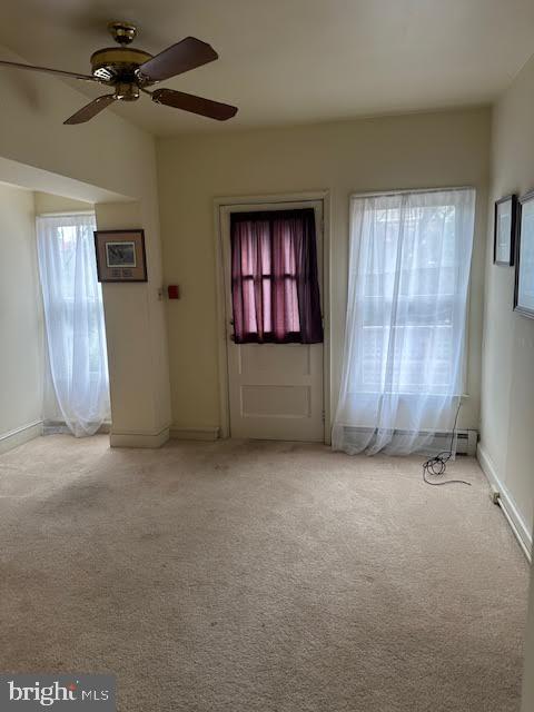 117 East Biddle Street West Chester, PA 19380 - Photo 4 of 11 an empty room with windows and fan
