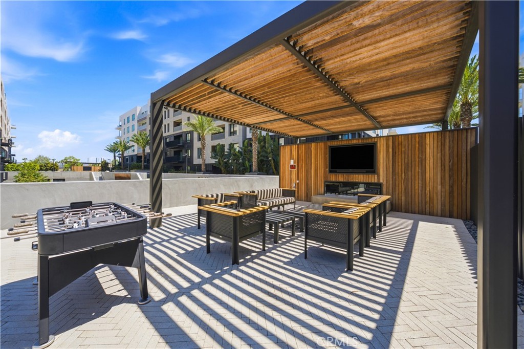 3101 Rivington Irvine, CA 92612 - Photo 26 of 42 a roof deck with a table and chairs