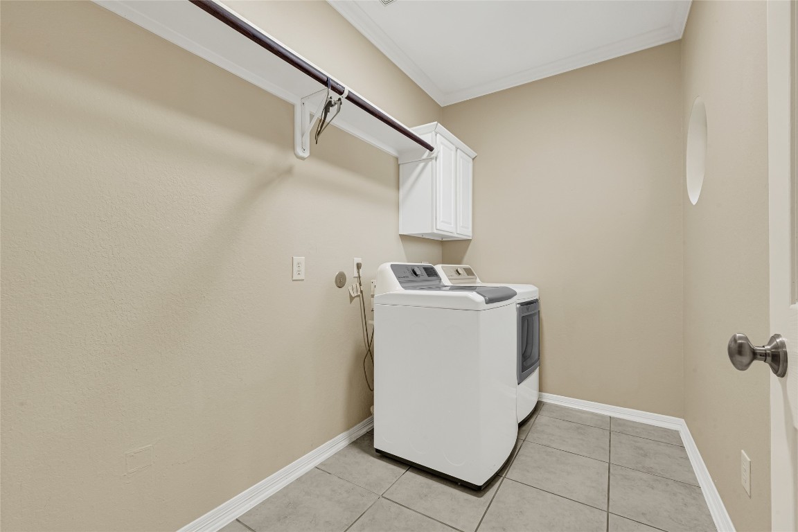 3906 Point Cuero Court Katy, TX 77494 - Photo 15 of 40 a utility room with dryer and washer