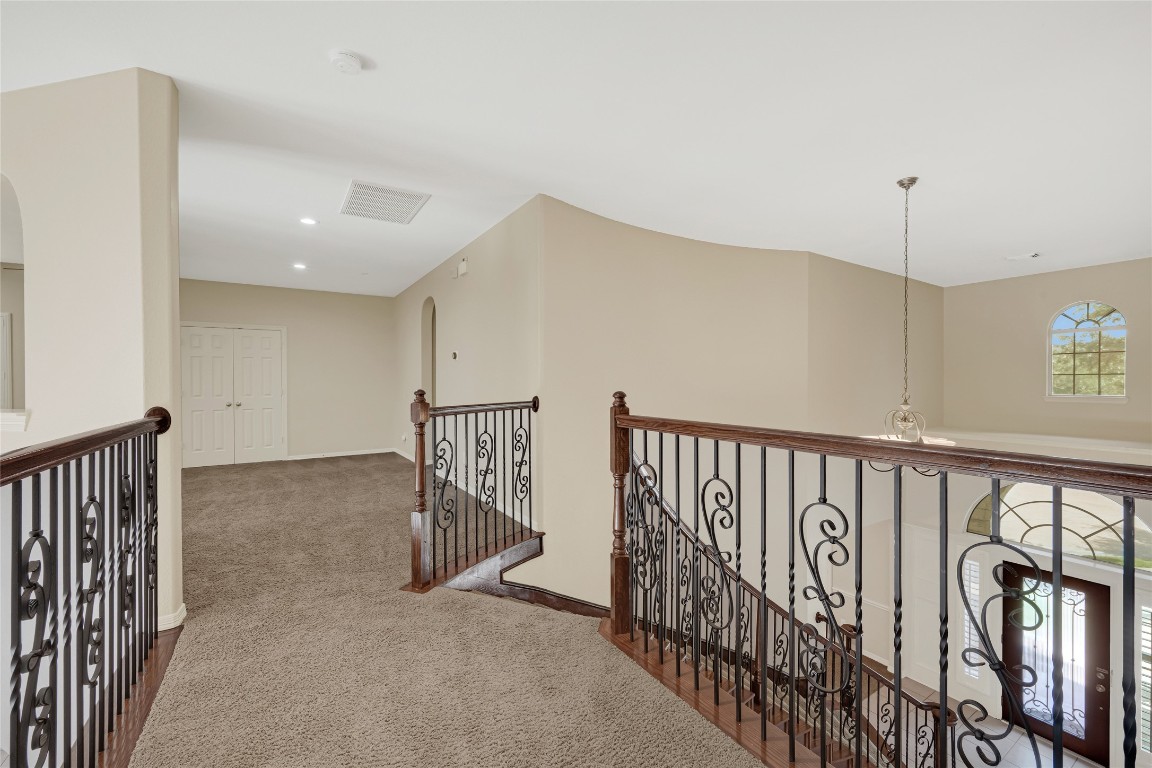 3906 Point Cuero Court Katy, TX 77494 - Photo 24 of 40 a view of hallway with stairs