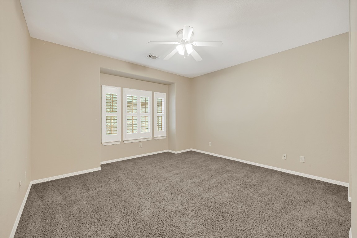 3906 Point Cuero Court Katy, TX 77494 - Photo 34 of 40 a view of an empty room with a window