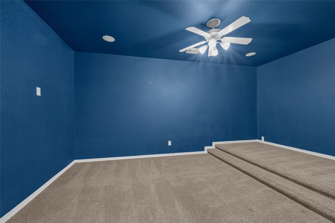 3906 Point Cuero Court Katy, TX 77494 - Photo 36 of 40 a view of a livingroom with a ceiling fan and window