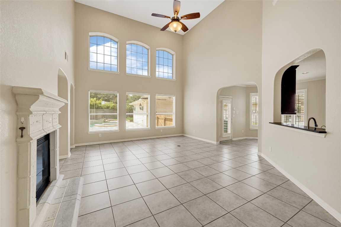 3906 Point Cuero Court Katy, TX 77494 - Photo 5 of 40 a view of a livingroom with wooden floor and a fireplace