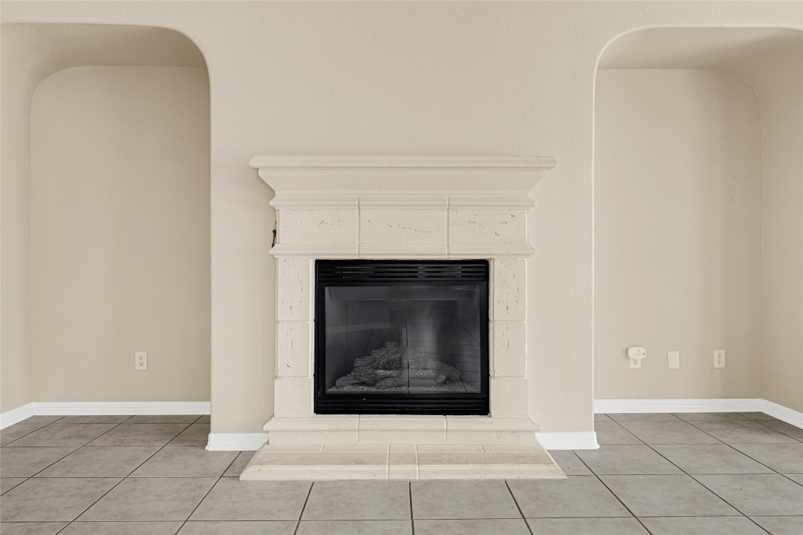 3906 Point Cuero Court Katy, TX 77494 - Photo 7 of 40 a view of an empty room with a fireplace