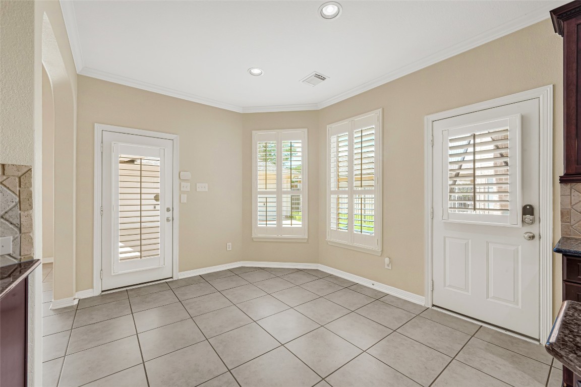 3906 Point Cuero Court Katy, TX 77494 - Photo 8 of 40 a view of an empty room with a window