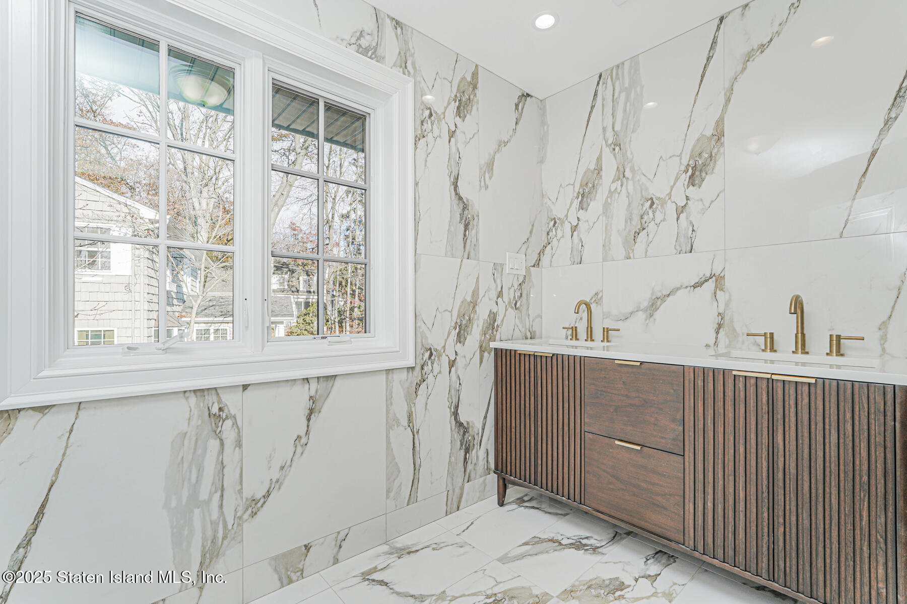 91 West Entry Road Staten Island, NY 10304 - Photo 36 of 57 a view of a bathroom with a window