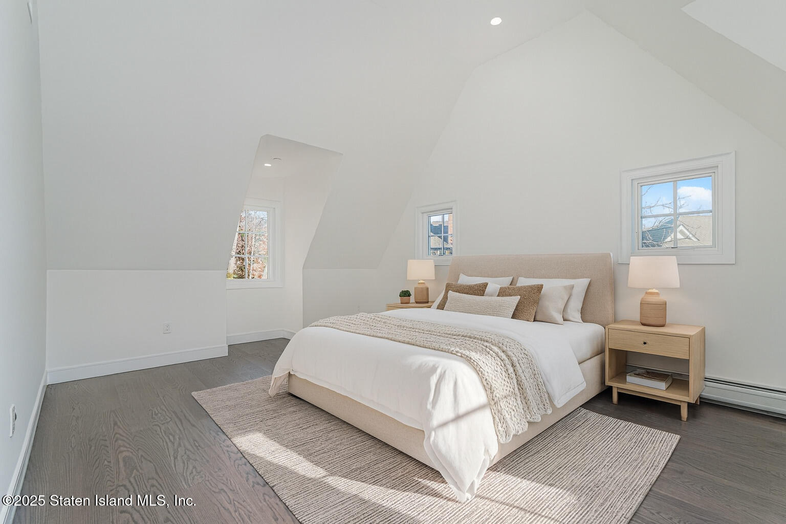 91 West Entry Road Staten Island, NY 10304 - Photo 47 of 57 a bedroom with a bed and a night stand