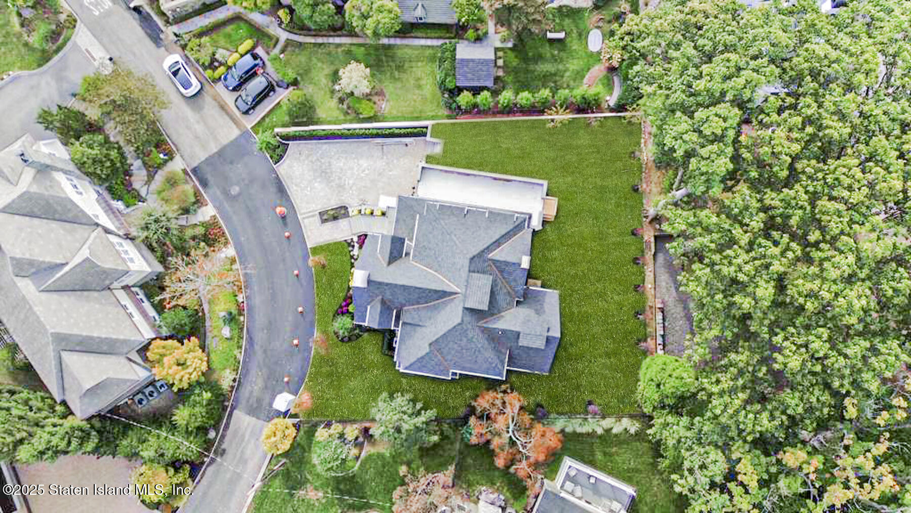 91 West Entry Road Staten Island, NY 10304 - Photo 6 of 57 an aerial view of a house with a garden