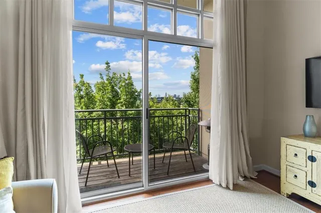 a view of a room with a large window