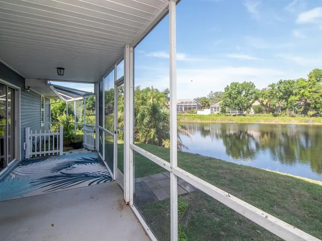 a view of a lake from a balcony