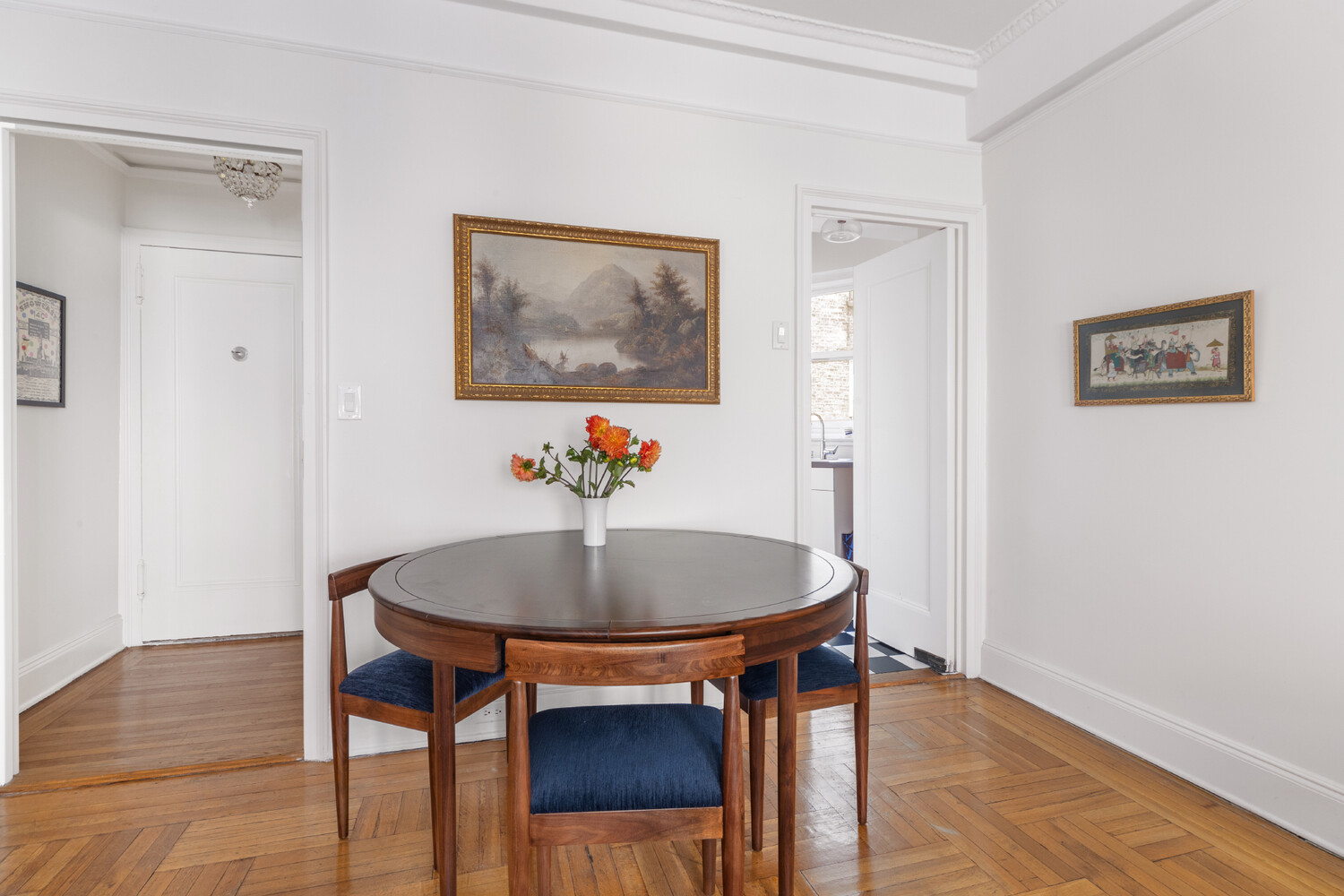 111 East 75th Street, Unit 7C Manhattan, NY 10021 - Photo 2 of 7 a dining room with furniture and wooden floor
