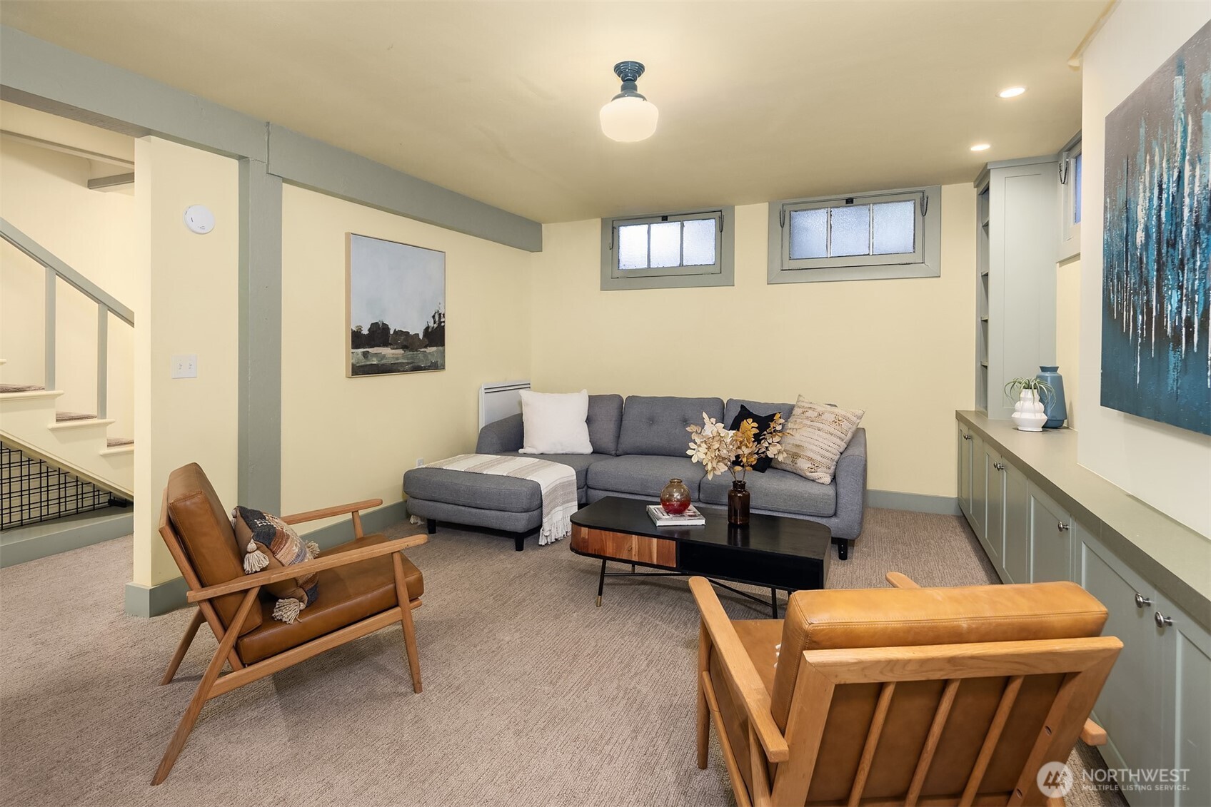 4800 Fremont Avenue North, Unit 202 Seattle, WA 98103 - Photo 17 of 30 a living room with furniture and a window
