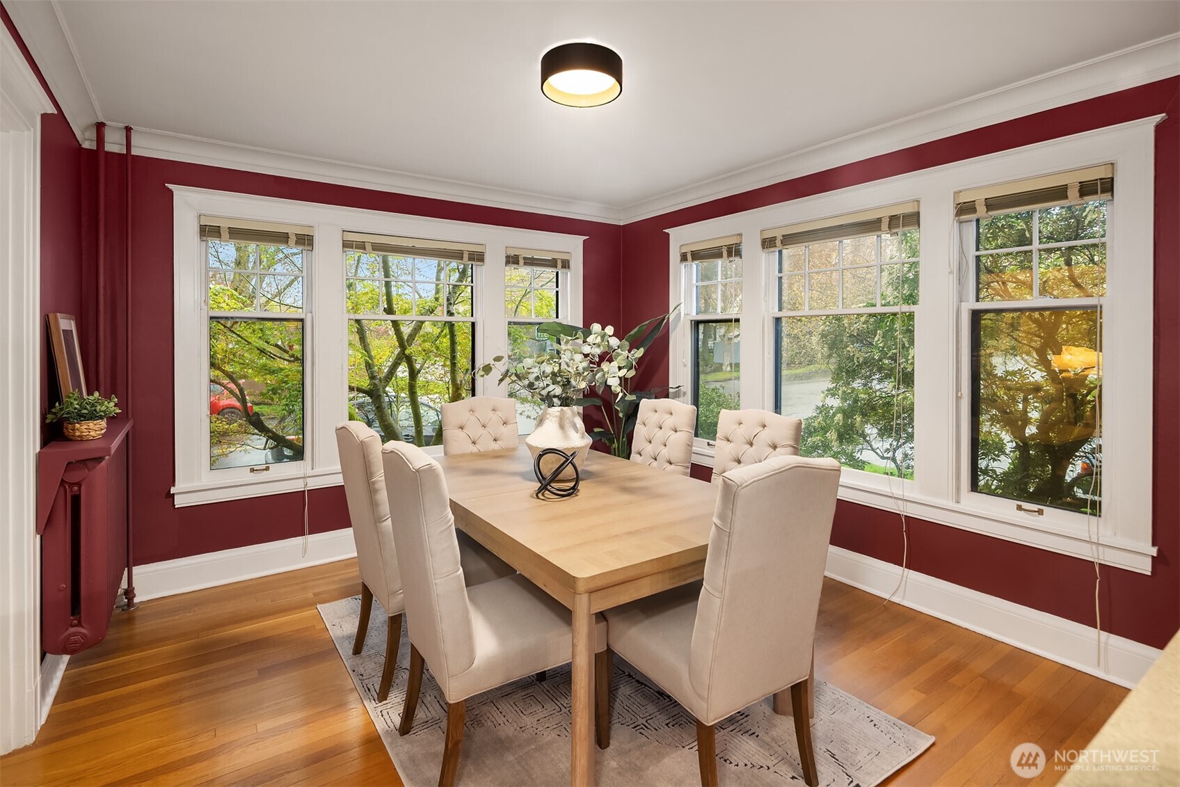 4800 Fremont Avenue North, Unit 202 Seattle, WA 98103 - Photo 6 of 30 a dining room with furniture window and wooden floor