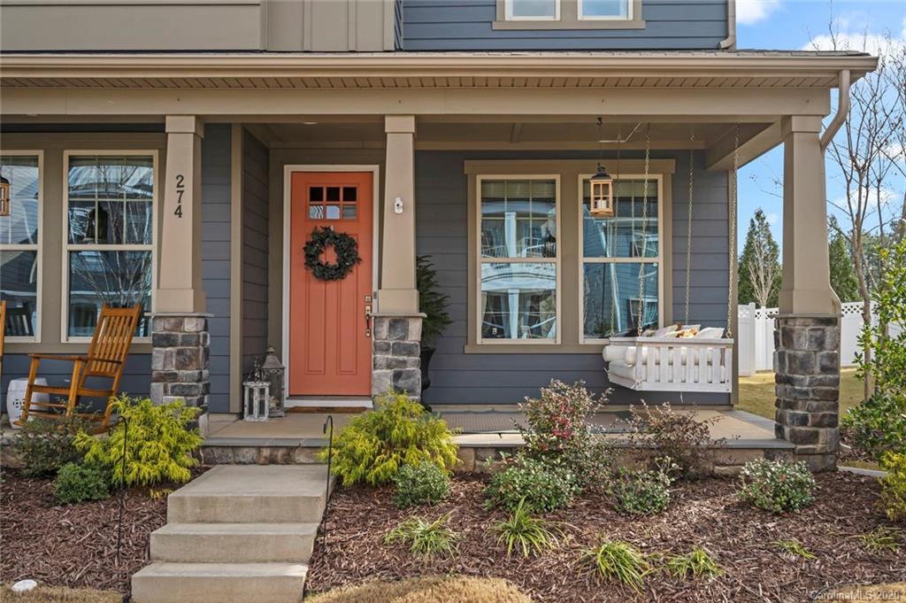 274 Helton Lane Fort Mill, SC 29708 - Photo 2 of 44 a view of a house with potted plants and a bench