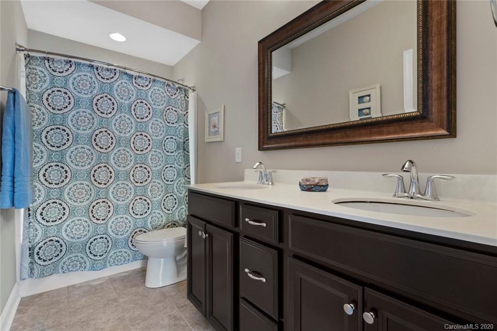 274 Helton Lane Fort Mill, SC 29708 - Photo 30 of 44 a bathroom with a toilet sink and mirror