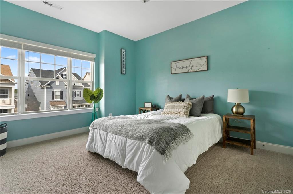 274 Helton Lane Fort Mill, SC 29708 - Photo 32 of 44 a spacious bedroom with a bed and a window