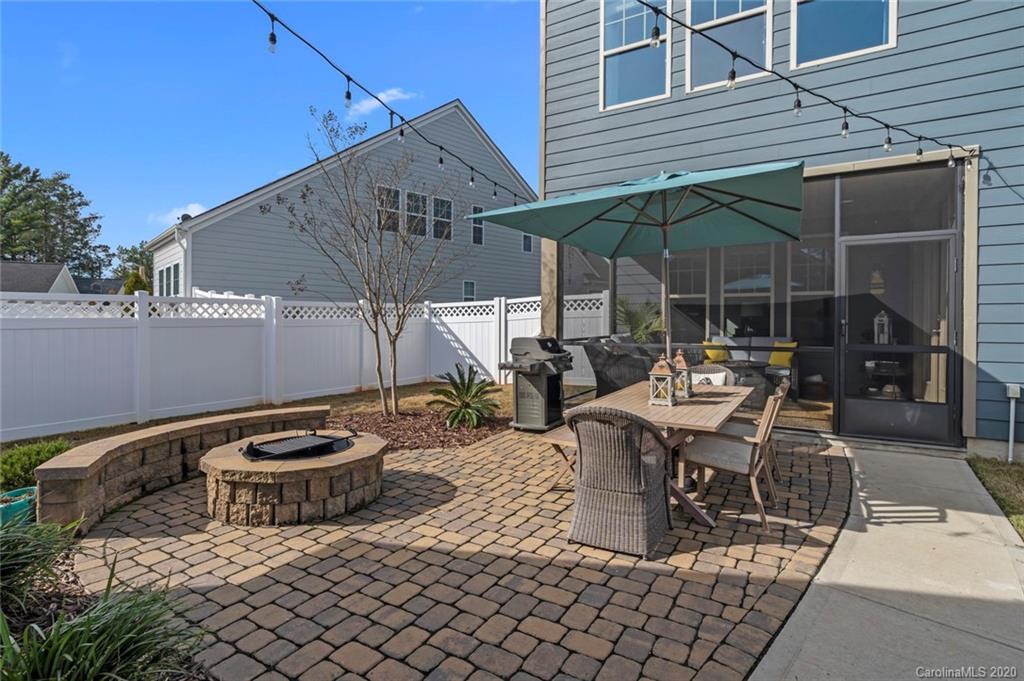 274 Helton Lane Fort Mill, SC 29708 - Photo 40 of 44 a view of a patio with table and chairs and potted plants