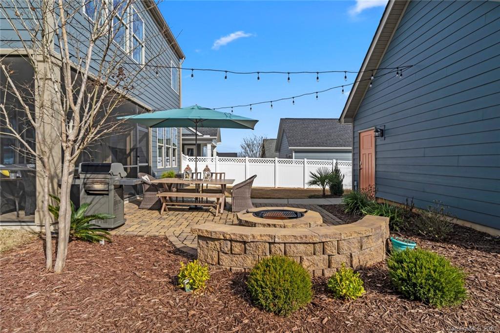 274 Helton Lane Fort Mill, SC 29708 - Photo 41 of 44 a view of a patio with chairs and potted plants