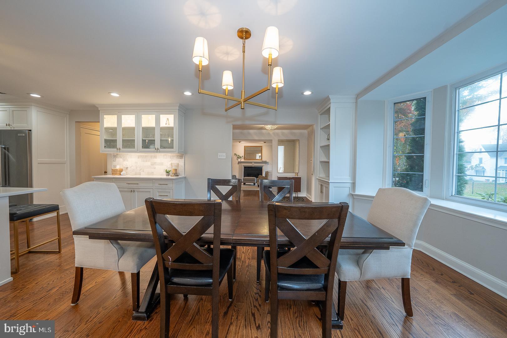 346 Winding Way Merion Station, PA 19066 - Photo 14 of 51 a view of a dining room with furniture and wooden floor