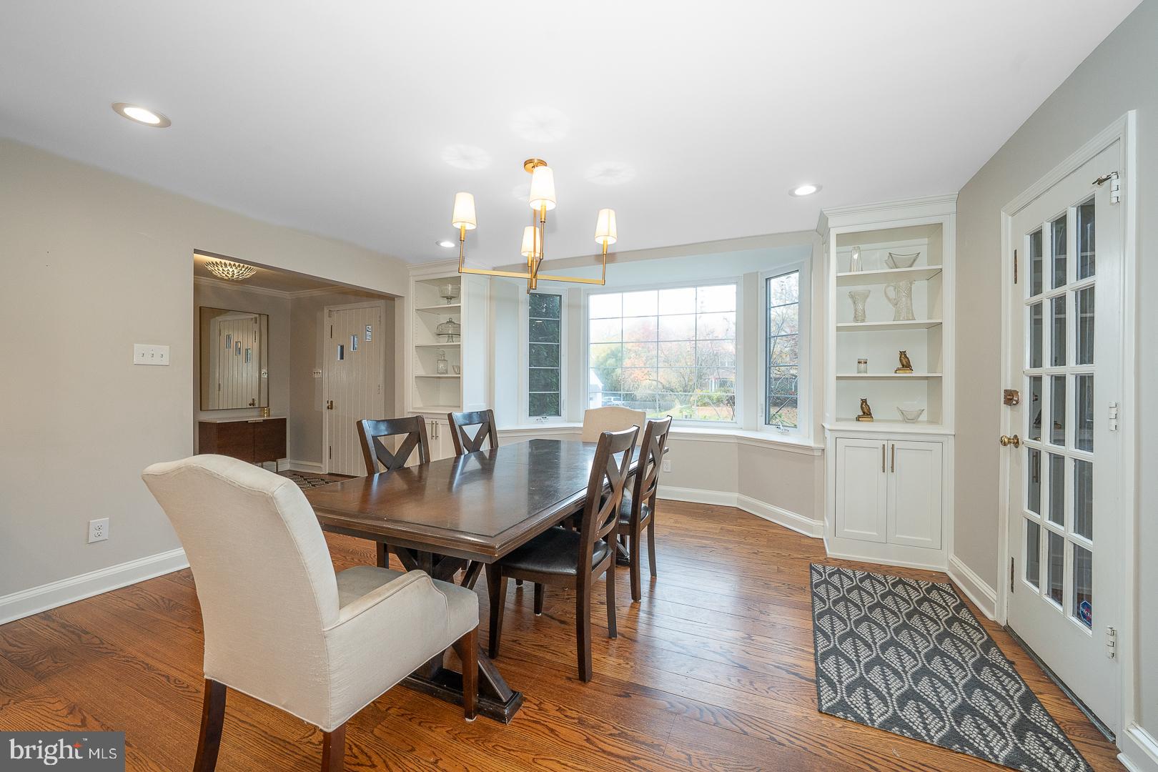 346 Winding Way Merion Station, PA 19066 - Photo 15 of 51 a view of a a dining room with furniture window and wooden floor