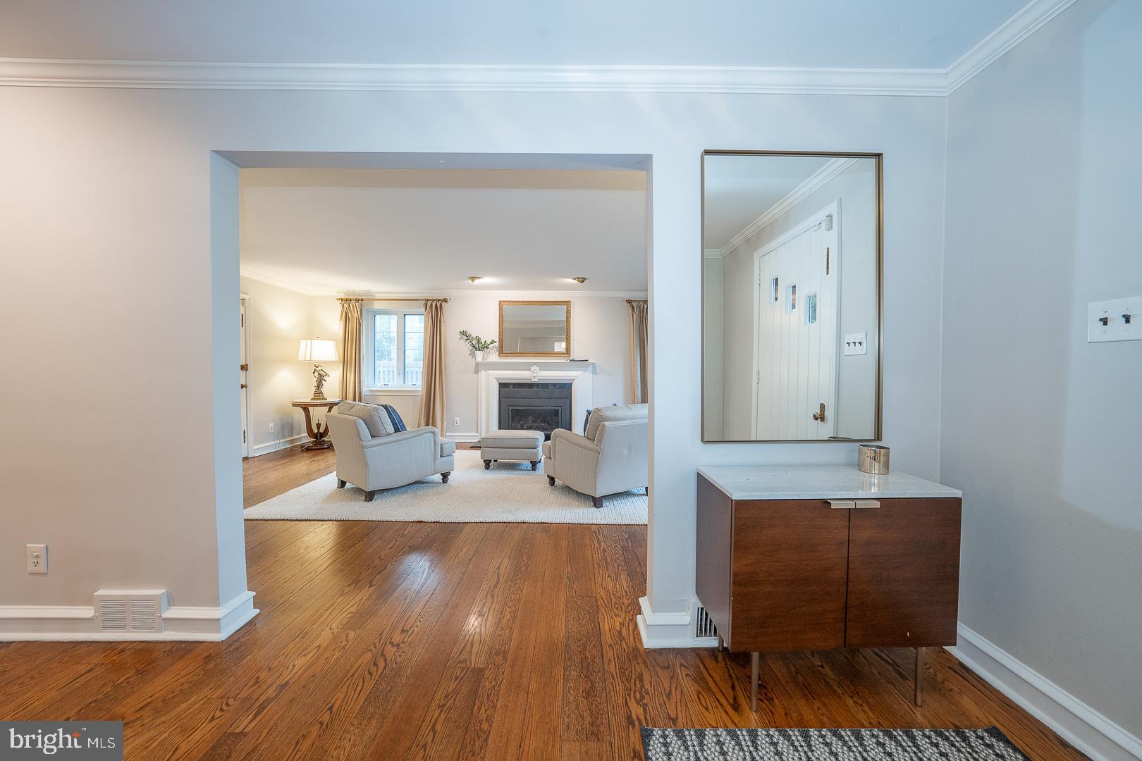 346 Winding Way Merion Station, PA 19066 - Photo 17 of 51 a living room with furniture and a wooden floor