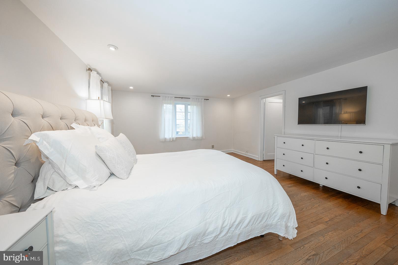 346 Winding Way Merion Station, PA 19066 - Photo 24 of 51 a bedroom with a bed and a flat screen tv