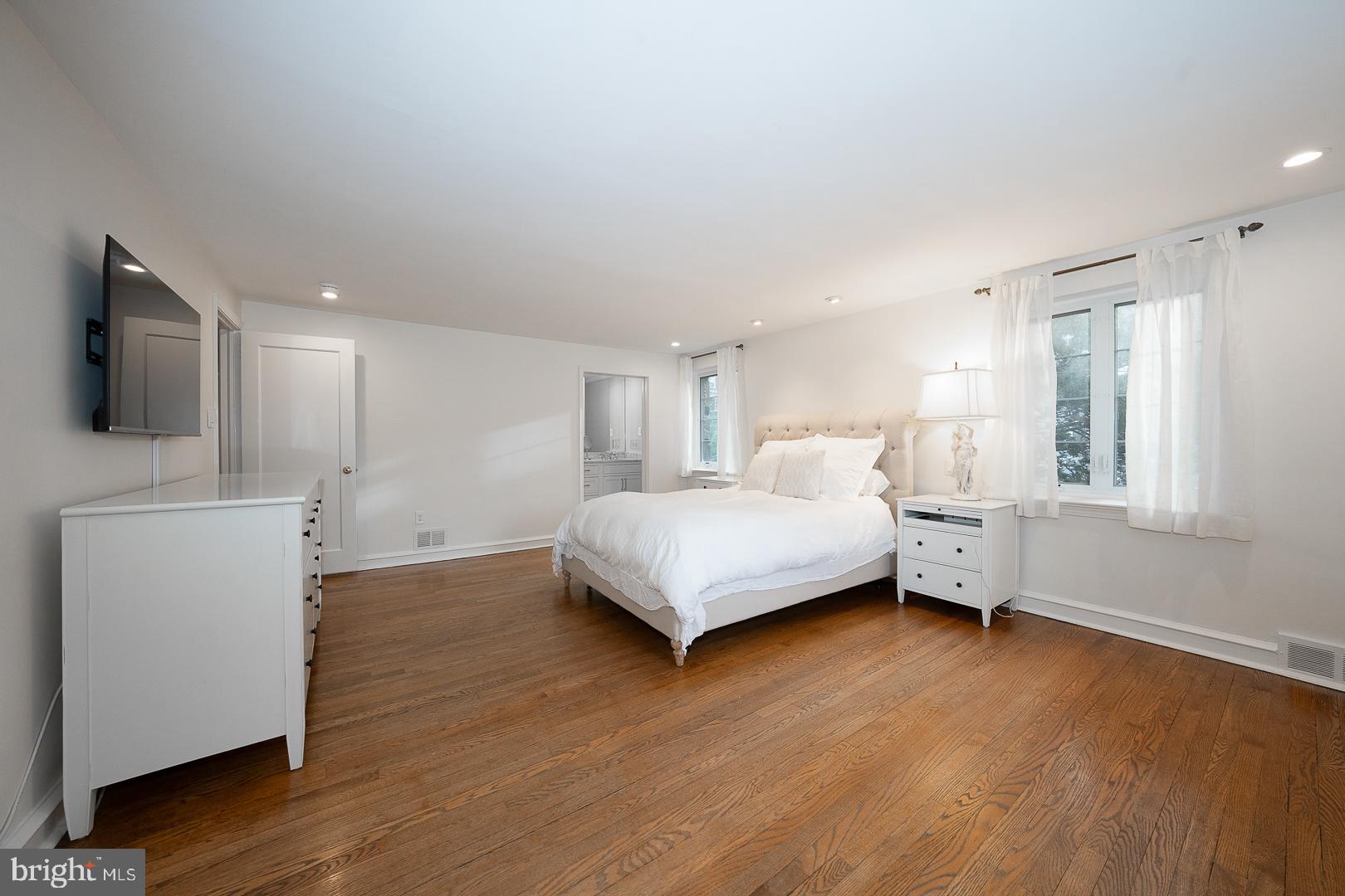 346 Winding Way Merion Station, PA 19066 - Photo 25 of 51 a bedroom with a bed and a night stand