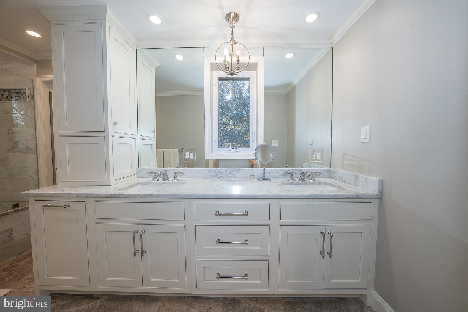 346 Winding Way Merion Station, PA 19066 - Photo 26 of 51 a bathroom with a sink and a mirror